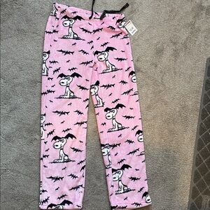 Snoopy fleece pajama bottoms . Womens size M.